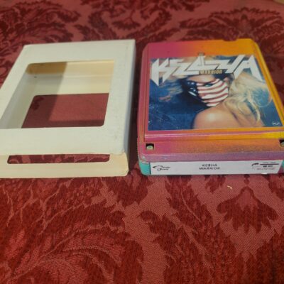 Kesha / Ke$ha, Warrior